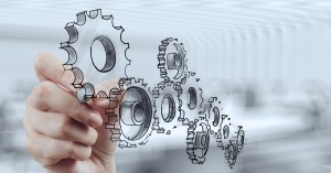 businessman hand draws gear to success concept